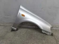 Popularny NISSAN ALMERA N16 LIFT 00-06 BLOTNIK PRZOD PRAWY KY0