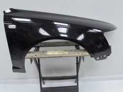 Bestseller AUDI A6 C6 04-08 BLOTNIK PRAWY PRZOD LY9B