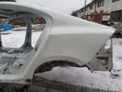 Zniżka VOLVO S60 II 10-17 CWIARTKA BLOTNIK LEWY TYL 614-46